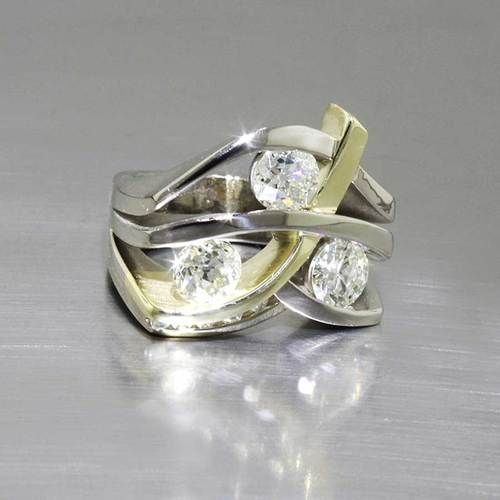 Vintage-Ring mit Zirkonias in Gold und Silber