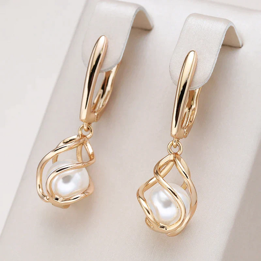 Elegante Perlenohrringe in Gold